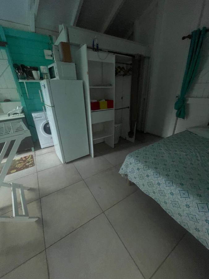 Duo d’appartement séparé par un couloir situé au bord de la mer Le Moule Exterior foto