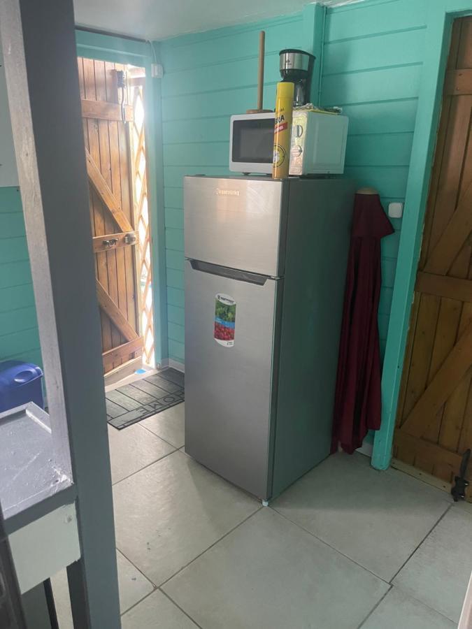Duo d’appartement séparé par un couloir situé au bord de la mer Le Moule Exterior foto